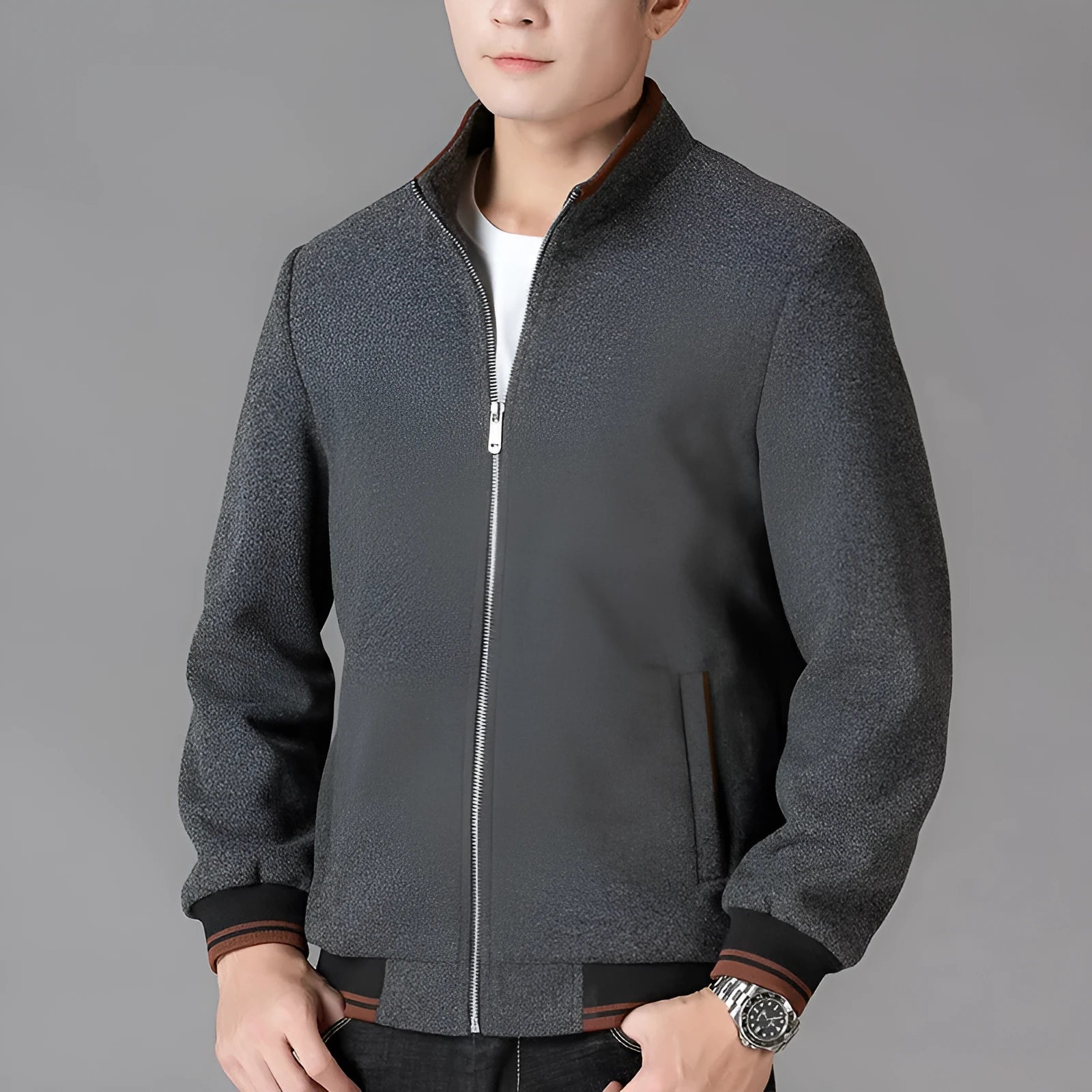 Men's grey sports-style fleece coat with long sleeves and a stick pocket