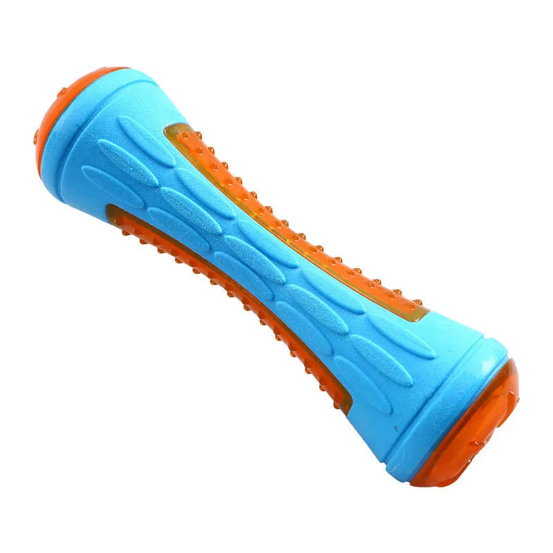 Set of four colourful floating dog toys: a ball, a barbell, and two tyres, on a blue background.