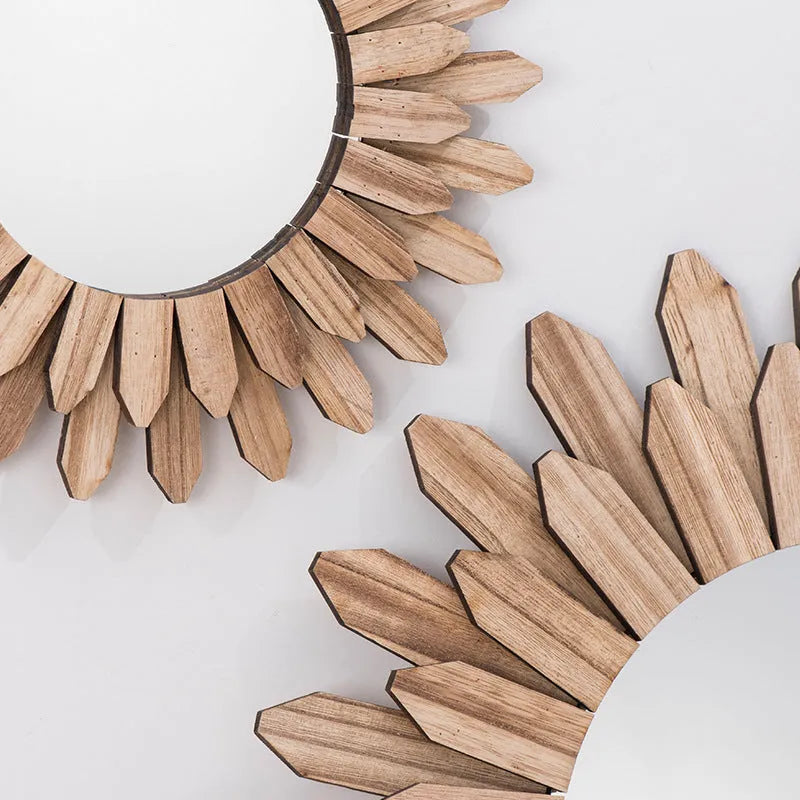 European-style round solid wood hanging mirror with a baked colour finish on a wall.