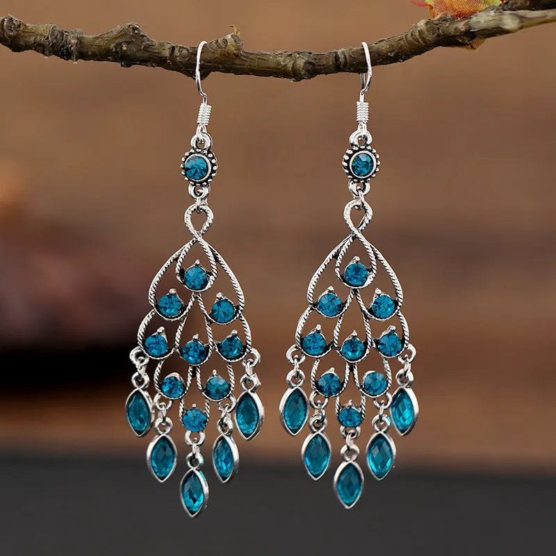 Purple retro crystal long fringe drop earrings with ethnic style details on an alloy base.
