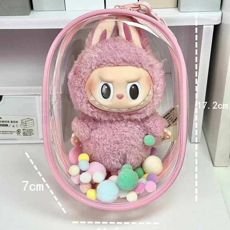 Transparent PVC cube storage bag with cartoon keychain and colourful ball in avocado green.