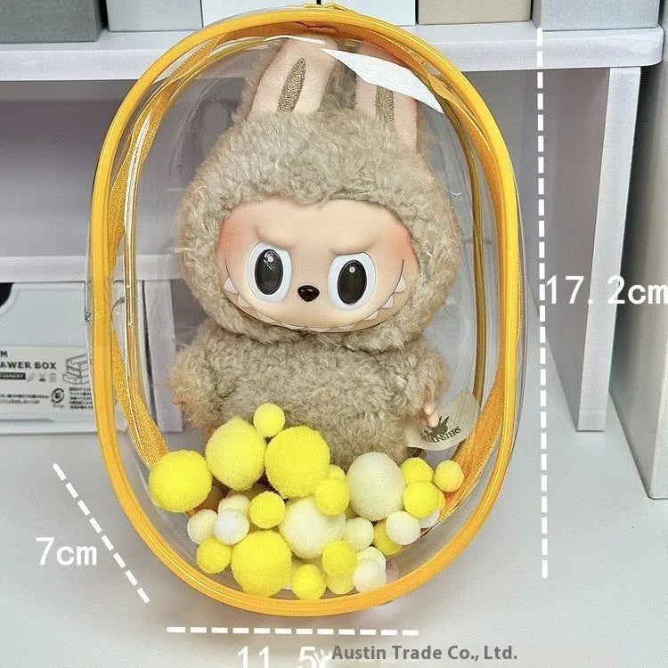 Transparent PVC cube storage bag with cartoon keychain and colourful ball in avocado green.