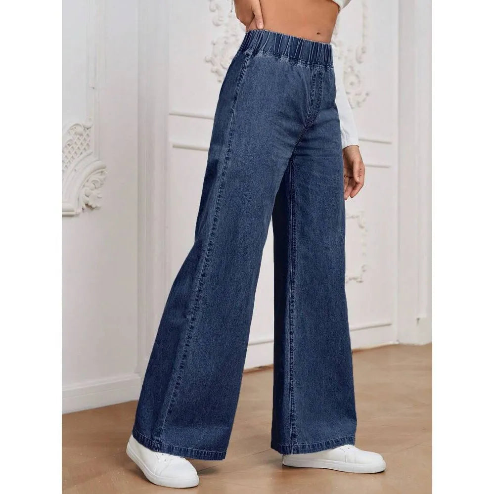 Plus size light blue washed denim trousers with a wide-leg straight cut and zip fly.