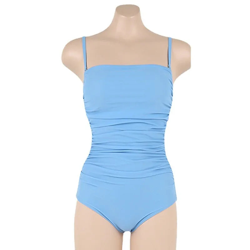 Blue one-piece sling style swimsuit with belly pleats and a slim-fit cut on a mannequin.