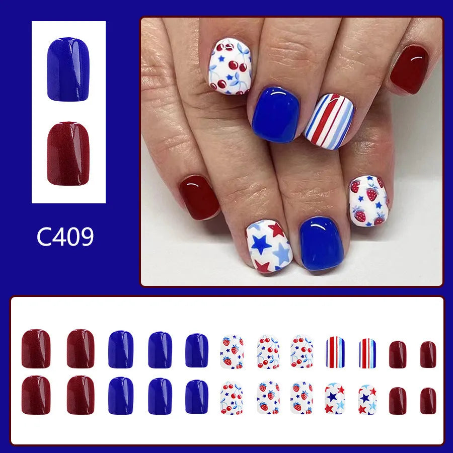 Short glossy red and blue strawberry cherry design nail stickers, 24 pieces.