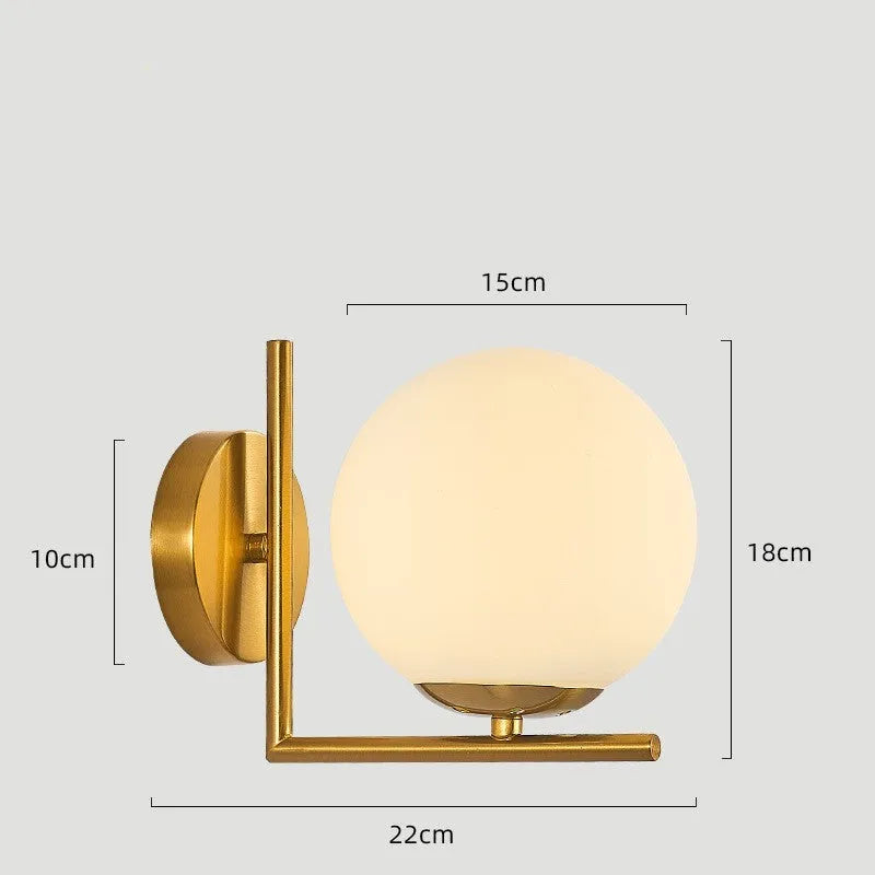 Modern copper coloured wall lamp with glass lampshade for bedroom or hallway lighting