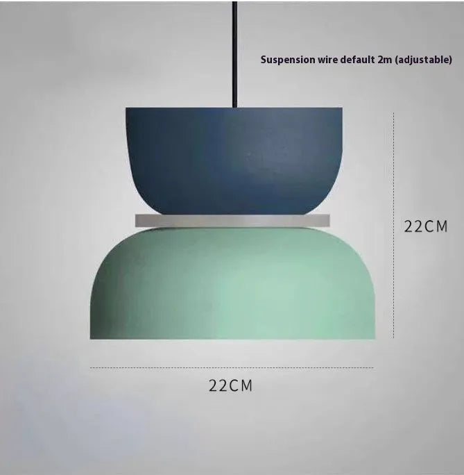 Nordic minimalist iron pendant light in a dark colour with a warm light bulb for bedroom or cafe use