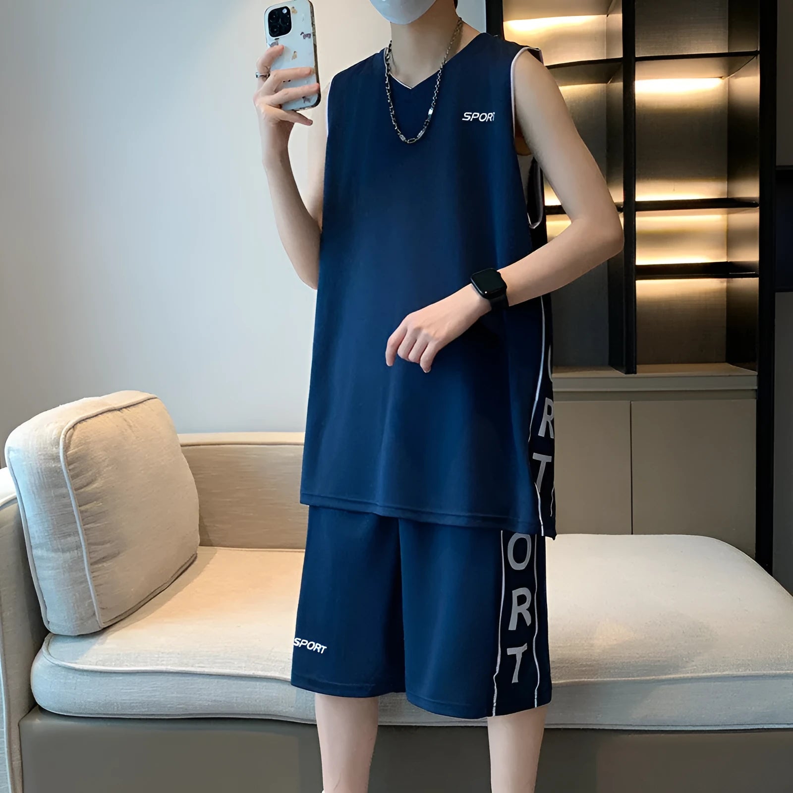 Polyester basketball sports suit with short sleeve vest and matching shorts in various colours