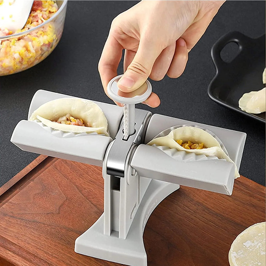 White double head dumpling mould with manual press mechanism and anti-slip rubber base