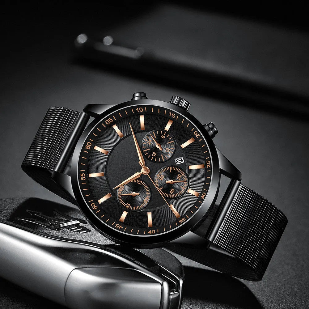 Mens fashion mesh strap waterproof watch with 43.5mm dial, mineral glass lens, and calendar feature in a silver finish