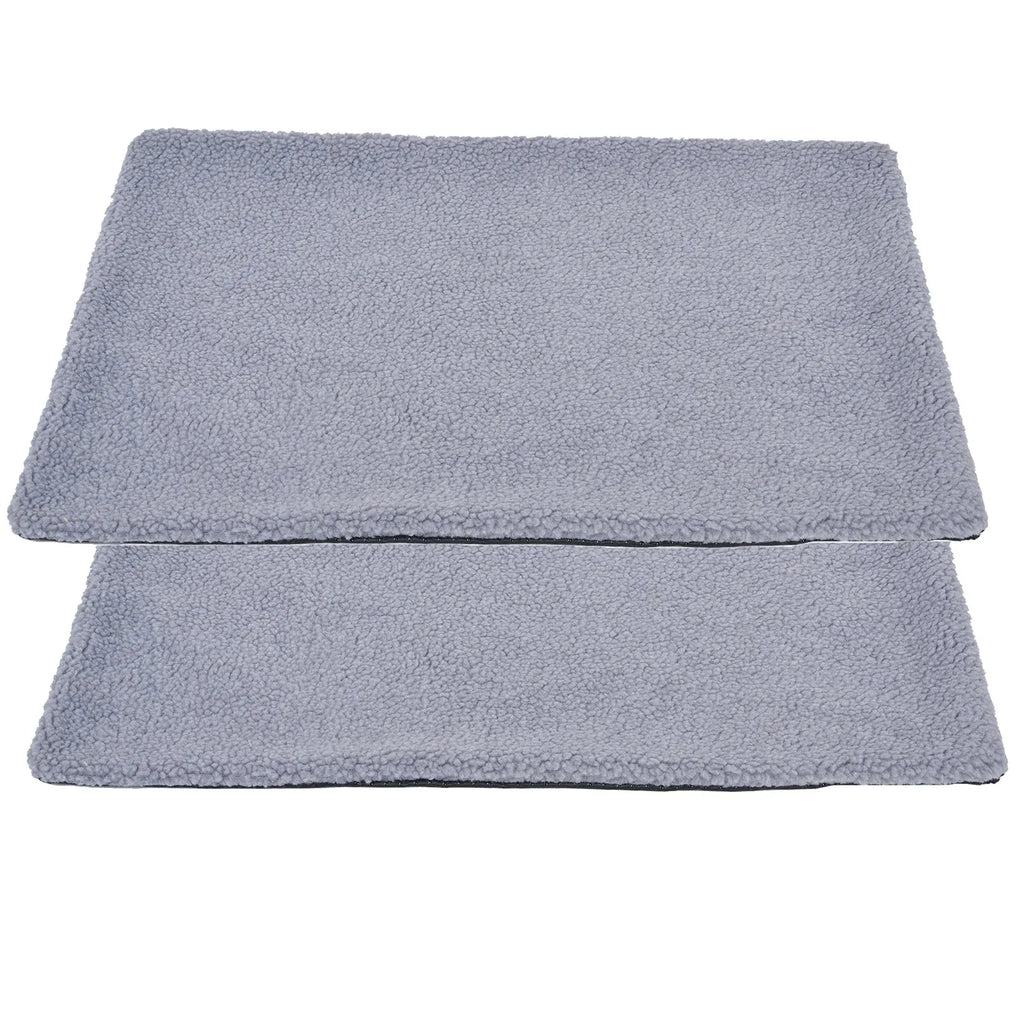 Grey self-heating plush pet bed blanket for cats on wooden floor