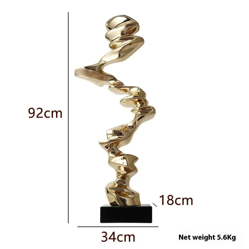Ran Ran Rose abstract resin sculpture in bright gold, silver, or blue on a neutral background.