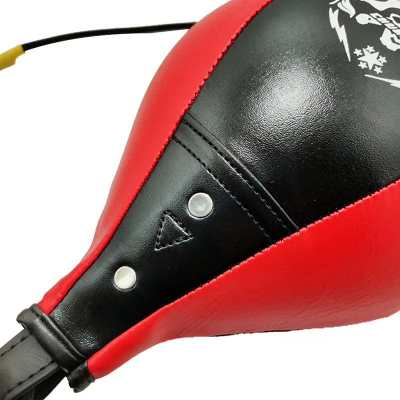 Black and red diamond pattern boxing speed ball with elastic cord hanging mount