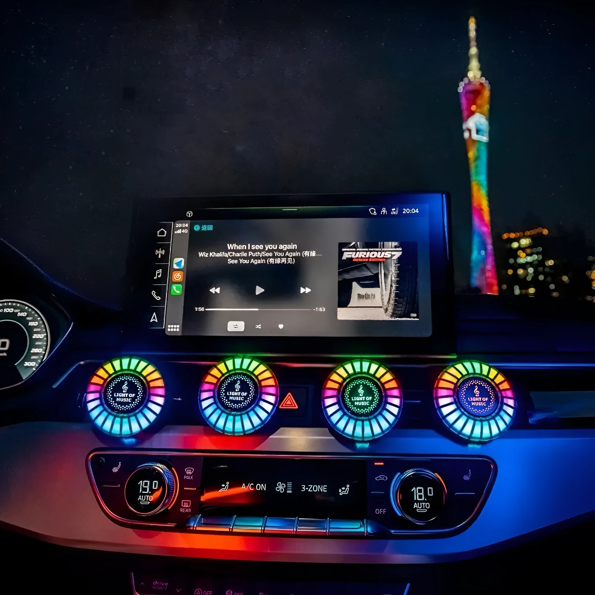Car air vent clip-on aromatherapy unit with RGB 3D projection light.