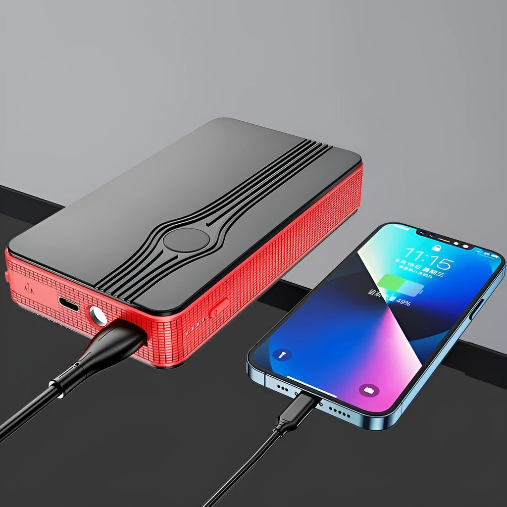 Red K4-E automobile emergency starting power supply unit with data cable, compact rectangular design.