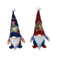 Two matching red and white faceless Rudolf suit doll candy bag Christmas ornaments hanging.