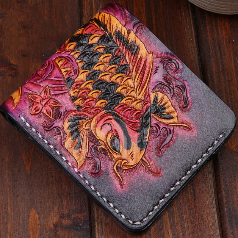 Men's hand-carved cow leather short bifold wallet in blue, showing compact size and textured finish.