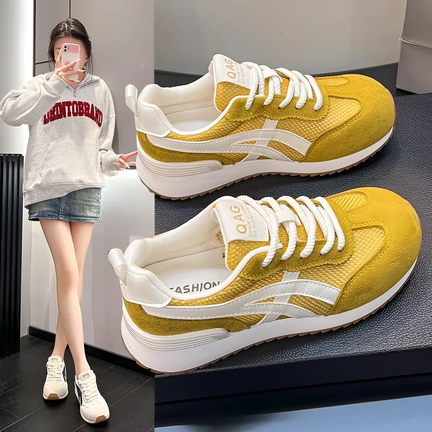 Women's white lace-up casual sneaker with round toe and flat heel on a non-slip sole.