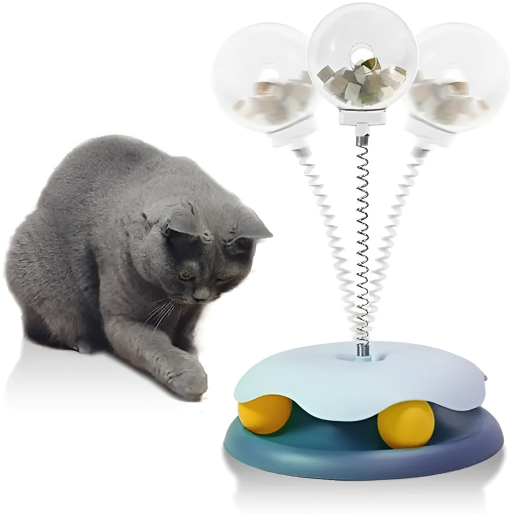 Blue interactive cat treat dispenser toy with track ball on a white background