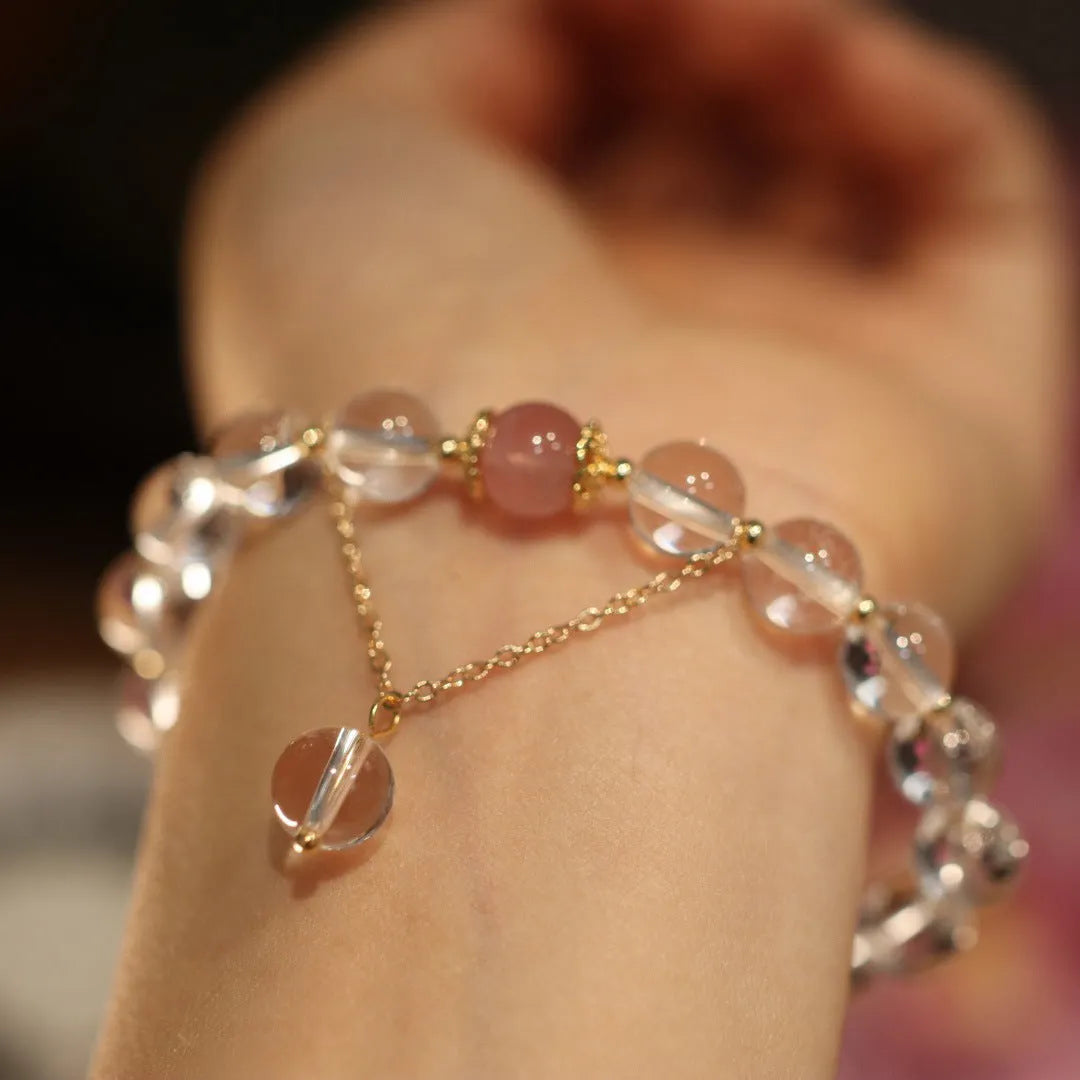 White and pink cat eye obsidian crystal bracelet with geometric Chinese patterns