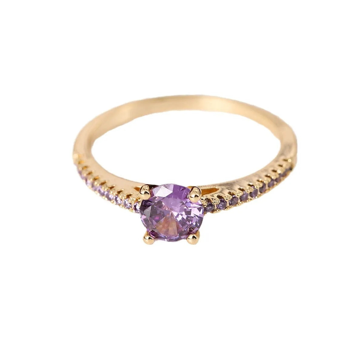 A geometric hexagon-shaped copper ring in a gun black and purple electroplated finish, shown from the side.