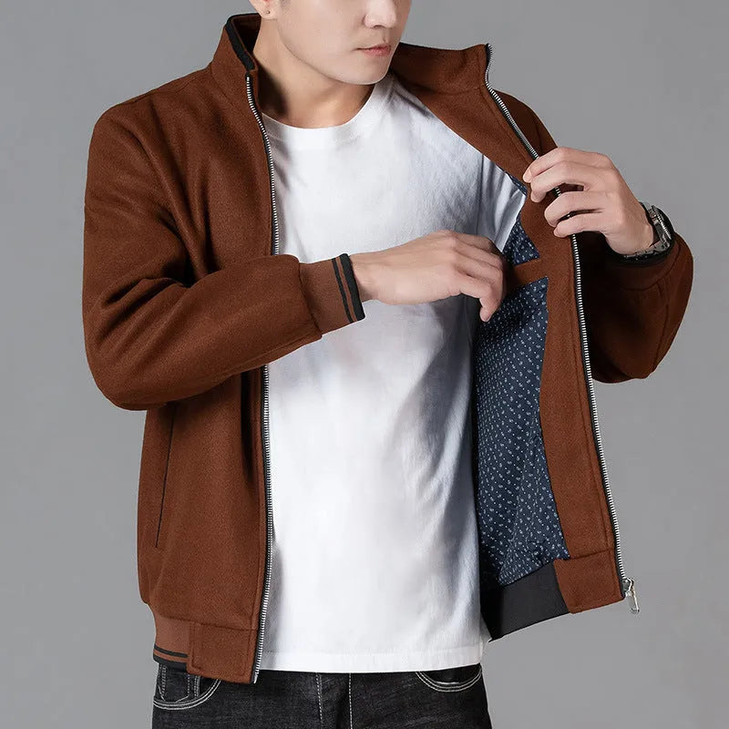 Men's grey sports-style fleece coat with long sleeves and a stick pocket