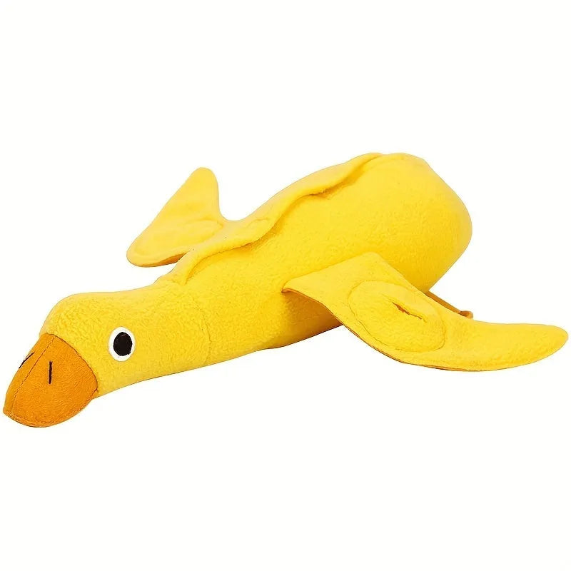 Yellow duck plush dog toy with squeaker and treat dispensing features