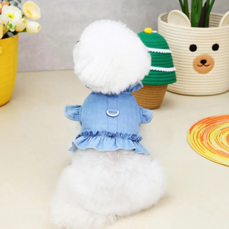 Blue denim dog dress with ruffles and built-in leash hook harness on chest and back