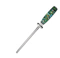 High carbon steel manual knife sharpener with abalone shell handle on a kitchen surface.