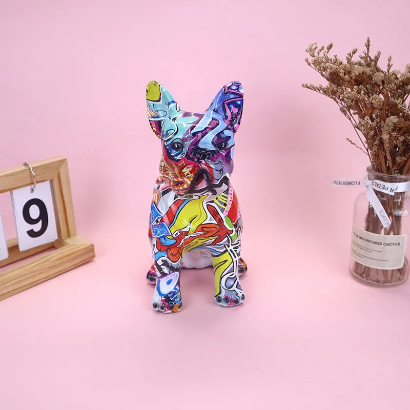 Graffiti finish resin French bulldog statue measuring 17cm in height on display surface