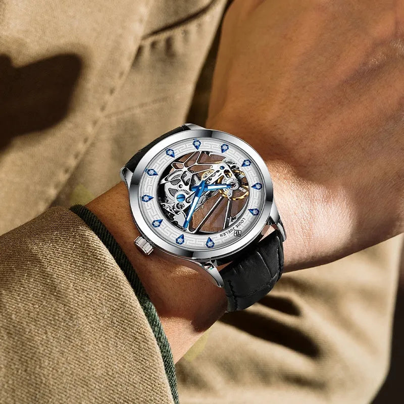 Men's silver case mechanical watch with white dial, blue luminous hands, and a black genuine leather strap.