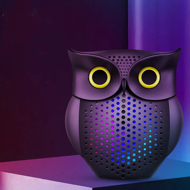 Black wireless Bluetooth speaker with cartoon owl design measuring 4 inches