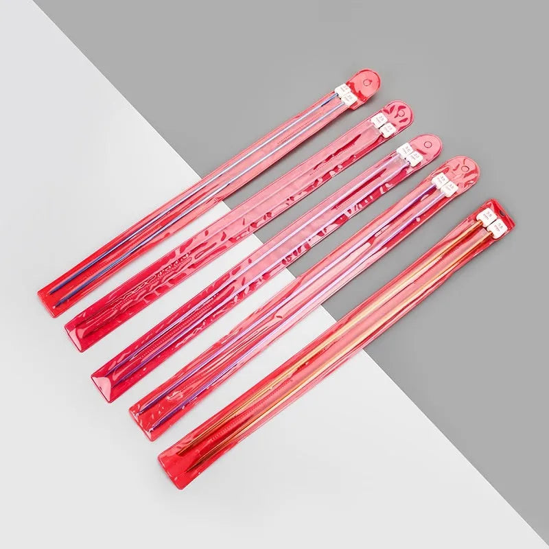 Set of aluminium crochet hooks with extended handles and protective caps, showing multiple sizes from 2.0mm to 10.0mm