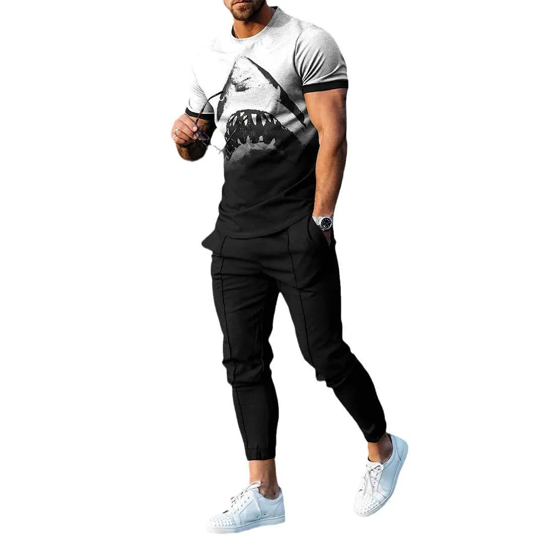 Men's short-sleeved printed pullover suit set with round neck T-shirt and matching trousers on a hanger.