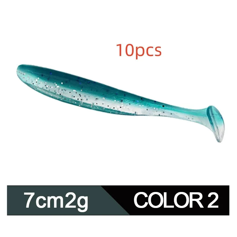 Two-tone soft plastic T-tail fishing lure measuring 7cm, shown in multiple colour variations.