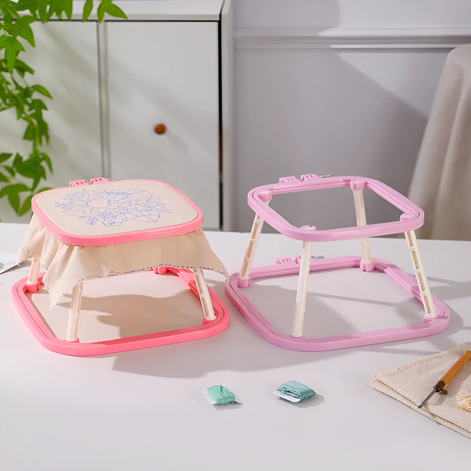French desktop embroidery frame with adjustable double-layer ABS design in light purple on a table