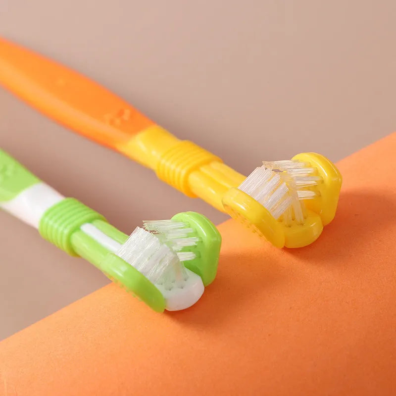 Pet toothbrush with soft nylon bristles on a plastic handle in various colour options for dogs and cats
