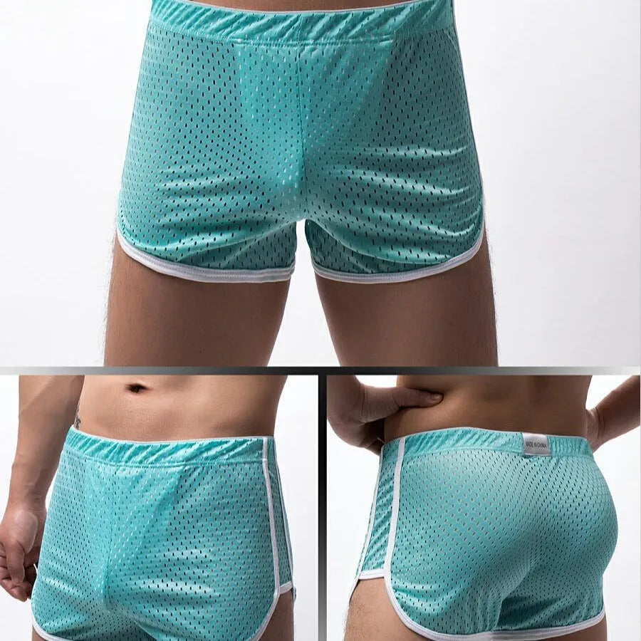 Men's black three-point boxer shorts with a mid-waistband, made from a breathable cotton and nylon fabric blend.