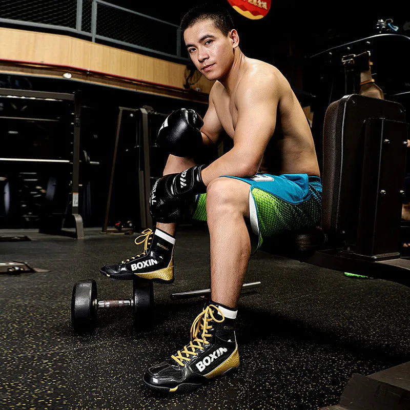 High-top mixed combat wrestling shoes in green, with mesh and leather upper and rubber sole.