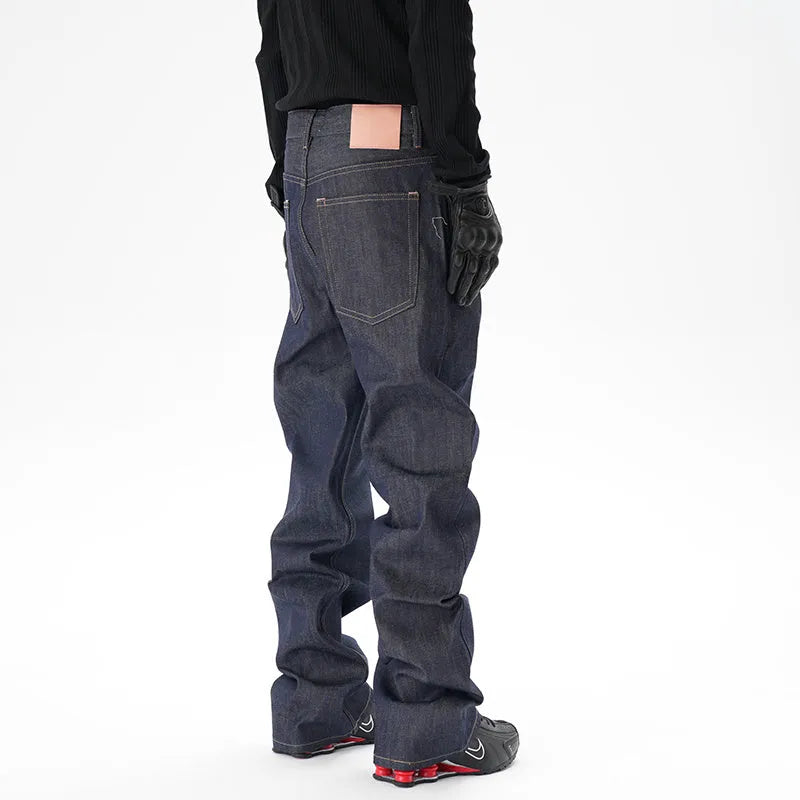 Dark blue loose straight-leg casual jeans on a neutral background.