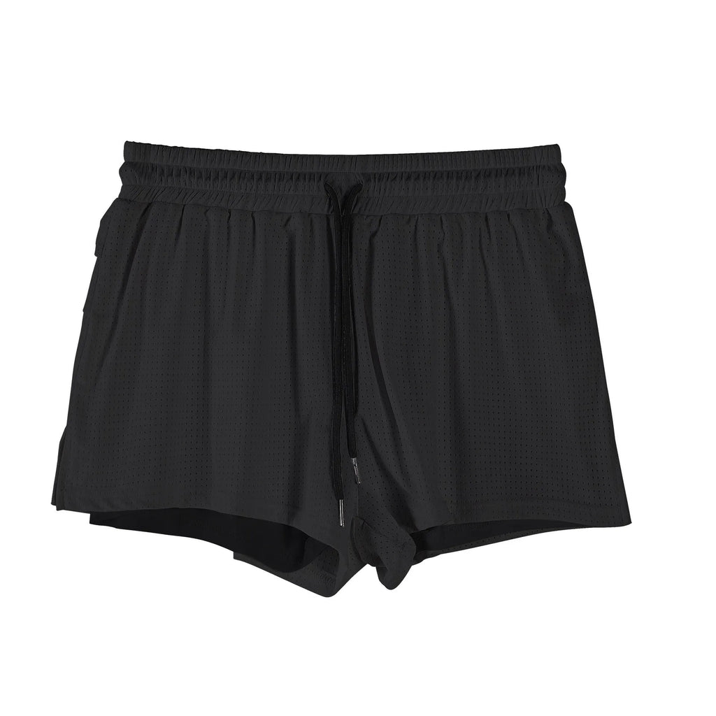 Man wearing black quick-dry nylon shorts with a mid-waist fit for summer sports