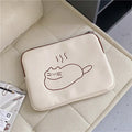 Embroidered fat cat design on a grey nylon tablet protective sleeve with a black zipper.