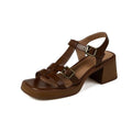 Black women's retro sandals with a T-buckle strap, chunky platform heel, and open square toe
