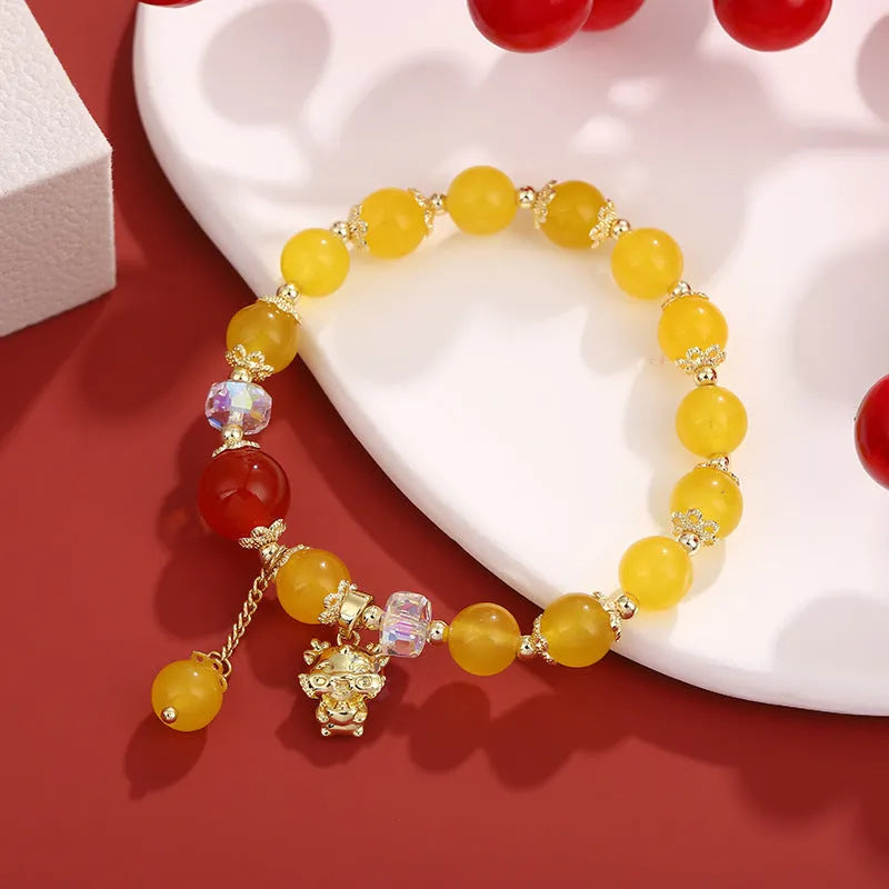 Chinese style natural stone beads bracelet with lucky coin and agate beads on white background