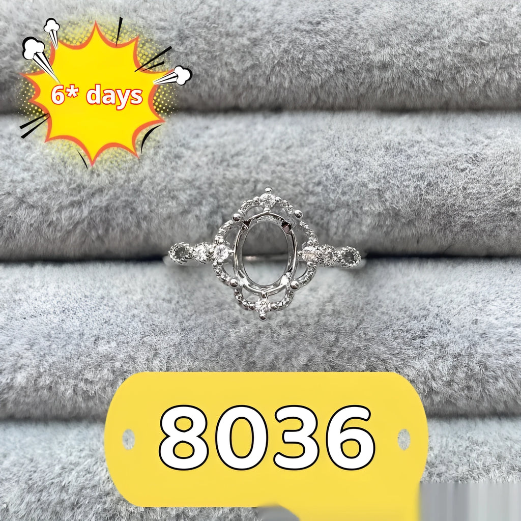 Oval denier open mouth ring with 6x8mm stone and five-pointed star on electroplated copper band.