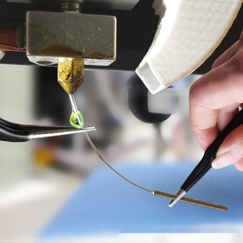 MK8 brass 0.4mm nozzle and stainless steel cleaning pin for 3D printer maintenance.