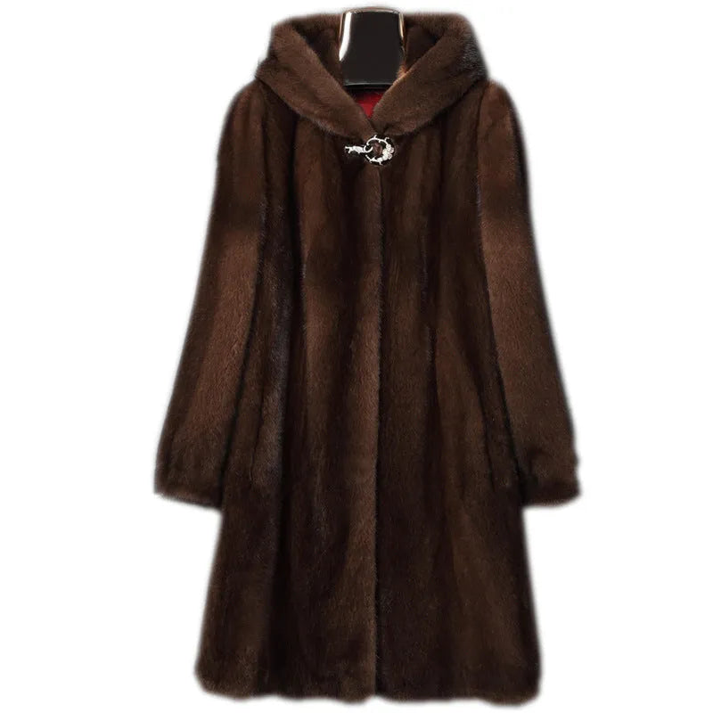 Women's long black faux fur hooded coat for winter street fashion.