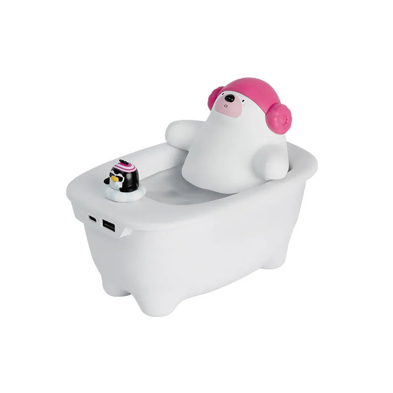 White compact USB air humidifier with large water tank on a desktop.