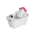 White compact USB air humidifier with large water tank on a desktop.
