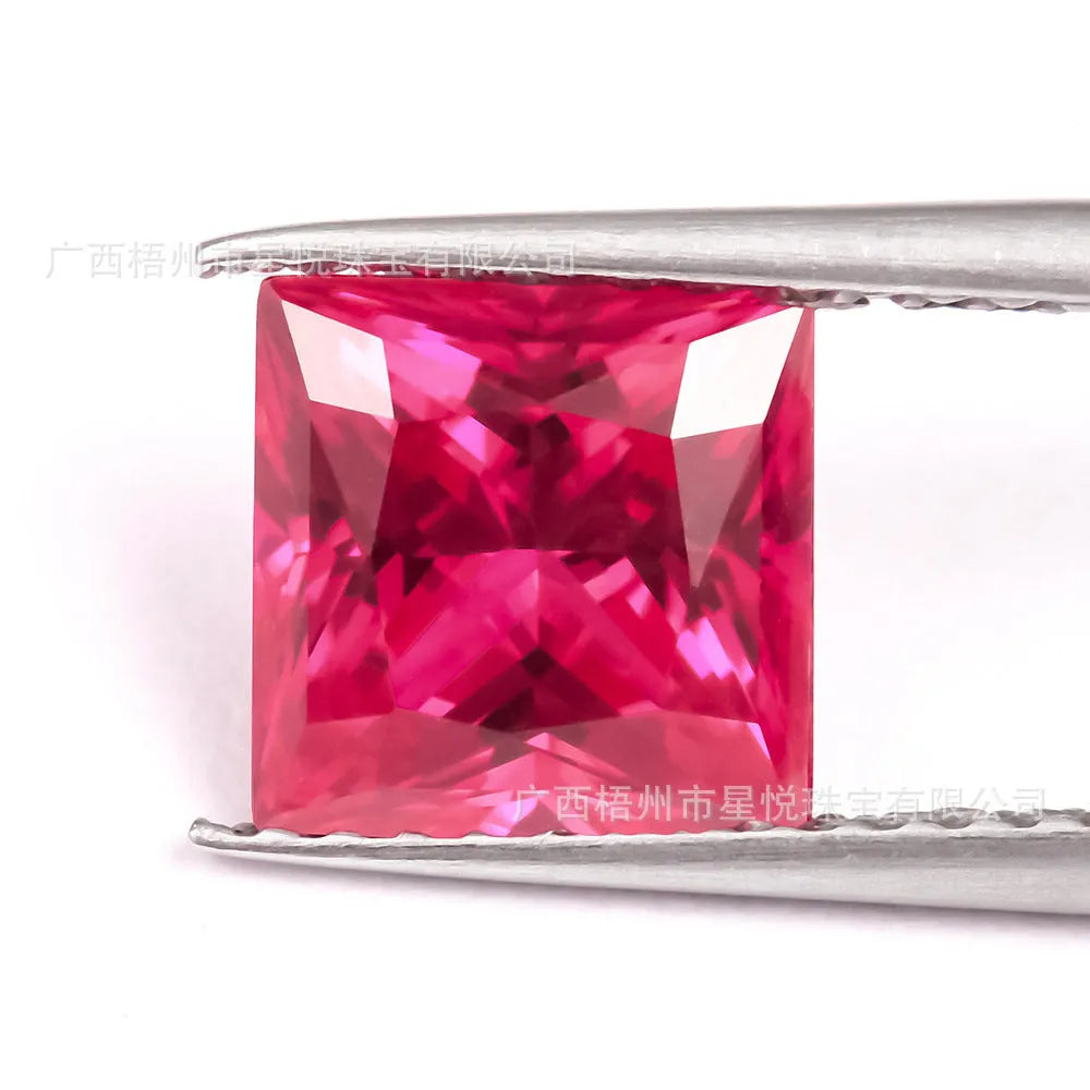 Artificial ruby gemstone in multiple cuts including round, princess square, and water drop shapes
